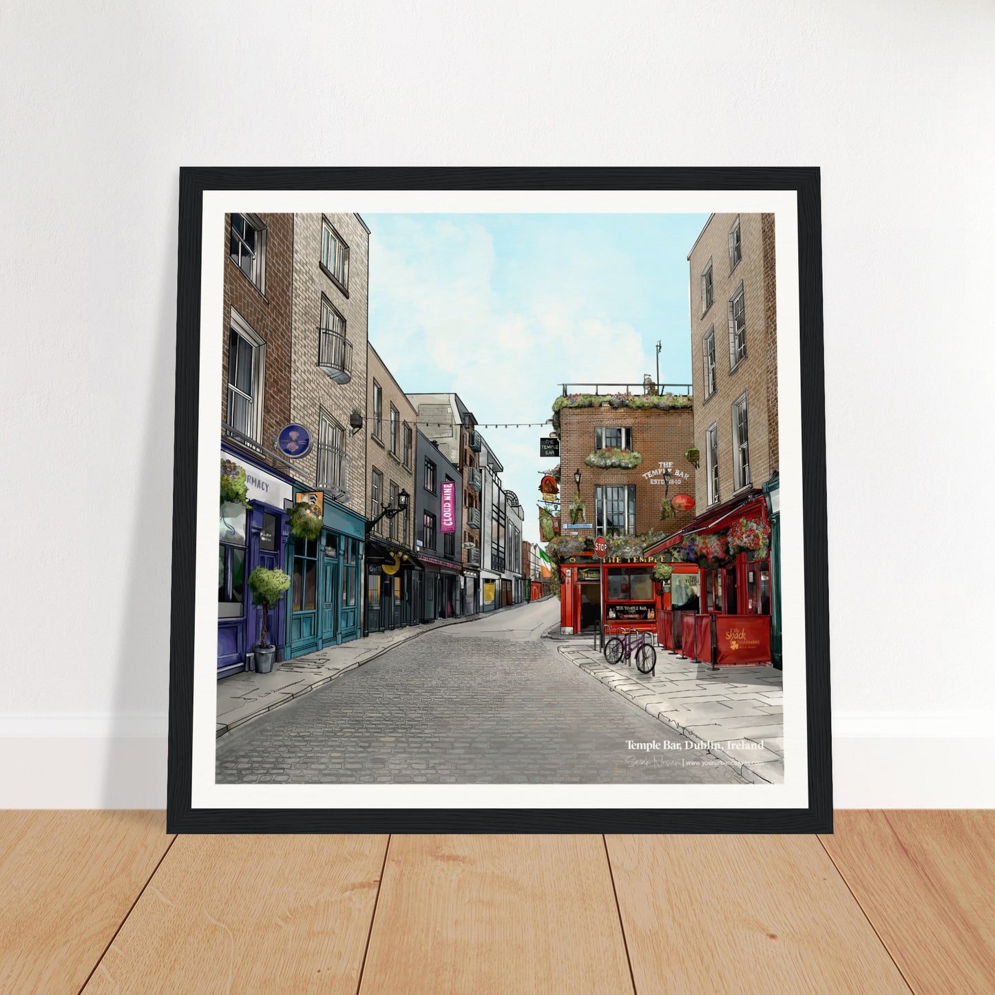 Dublin - Subtle Title print, size 30x30cm, framed in black, capturing the bustling streets of Temple Bar with it's iconic cobblestone streets.
