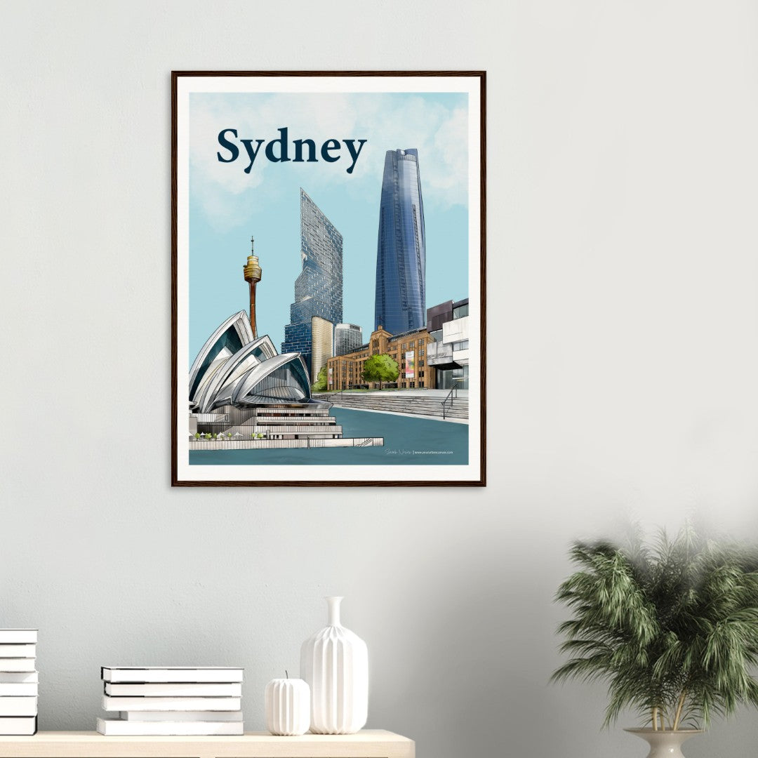 60x80cm Sydney cityscape artwork hanging in a modern hallway. The vibrant print features iconic landmarks like the Sydney Opera House and Sydney Harbour, Centrepoint, One Barangaroo and the Museum of Contemporary Art.