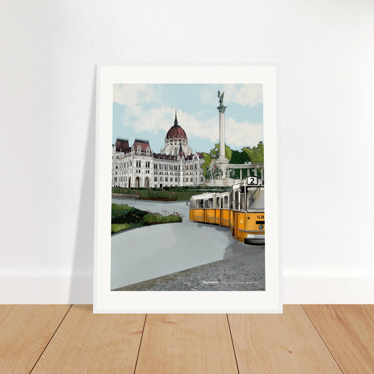 Budapest - Subtle Title print, size 45x60cm, framed in white, displaying the majestic Heroes' Square, the Hungarian Parliament, and the yellow tram moving across Budapest's charming cobbled streets.