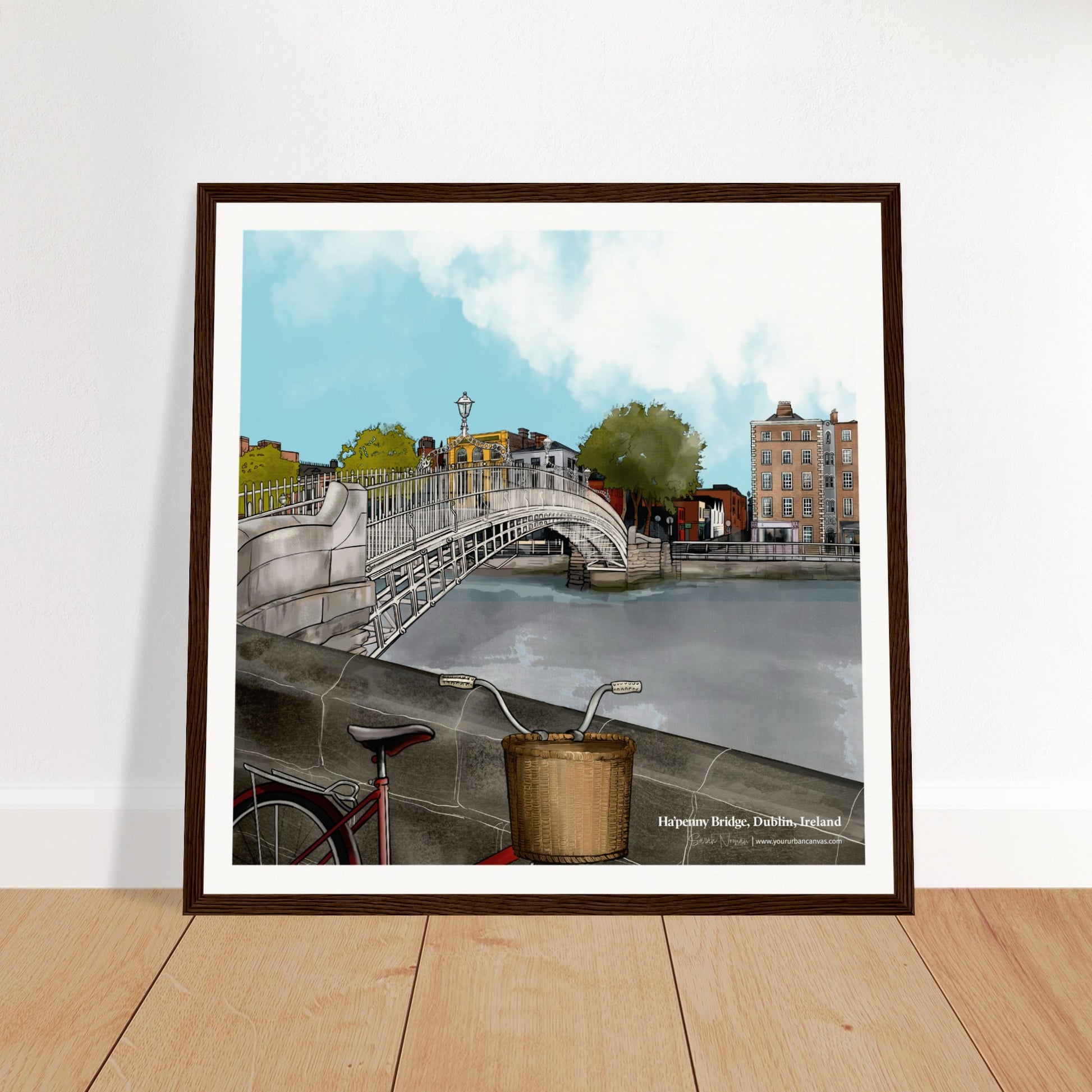 Framed artwork of Ha'penny Bridge Dublin, 40x40cm, in a dark wood frame. Classic Irish wall art capturing a beloved Dublin landmark in timeless style.
