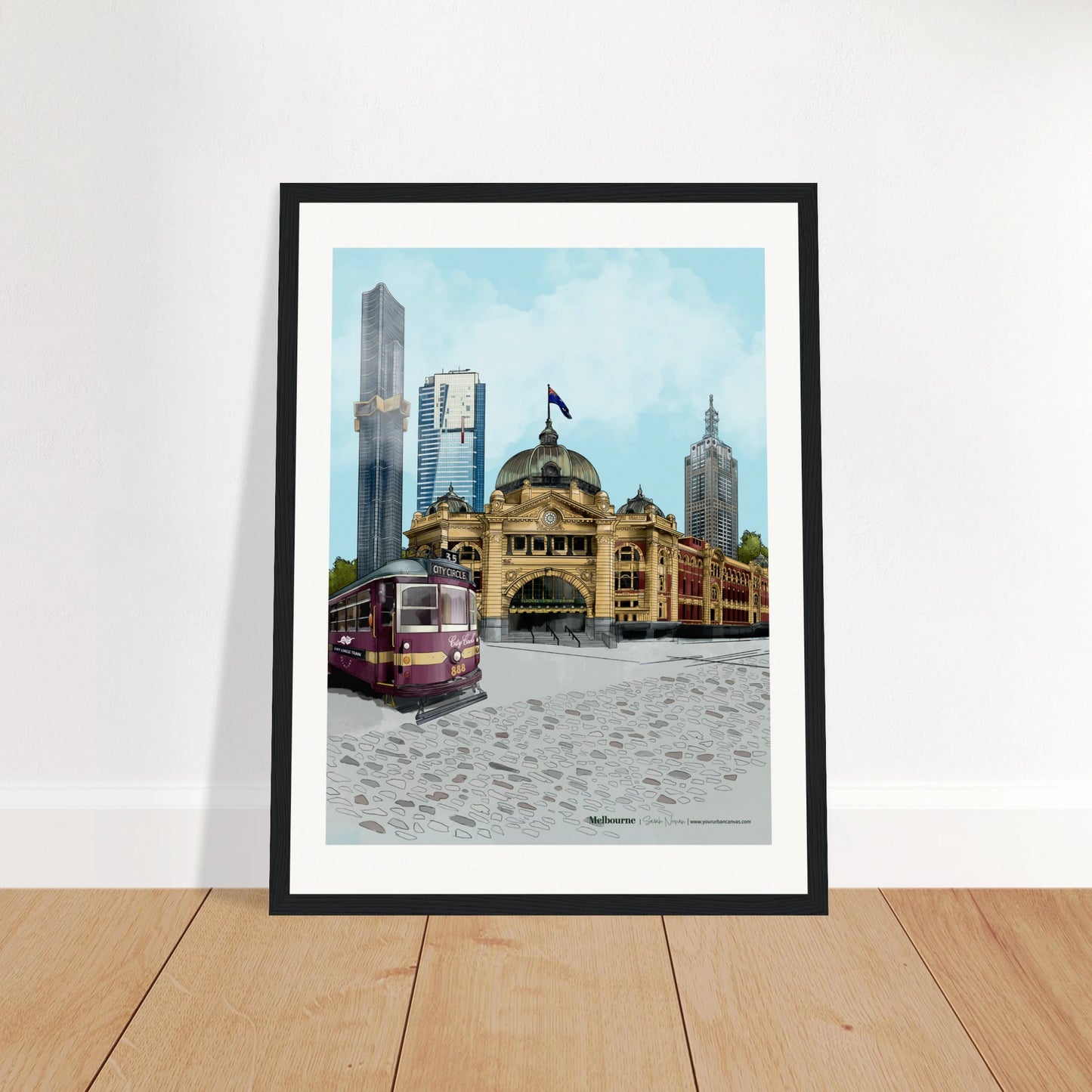 Melbourne - Subtle Title print, size 30x40cm, framed in black, focusing on the architectural beauty of Flinders Street Station and the City Circle Tram, with Australia 108 in the background.