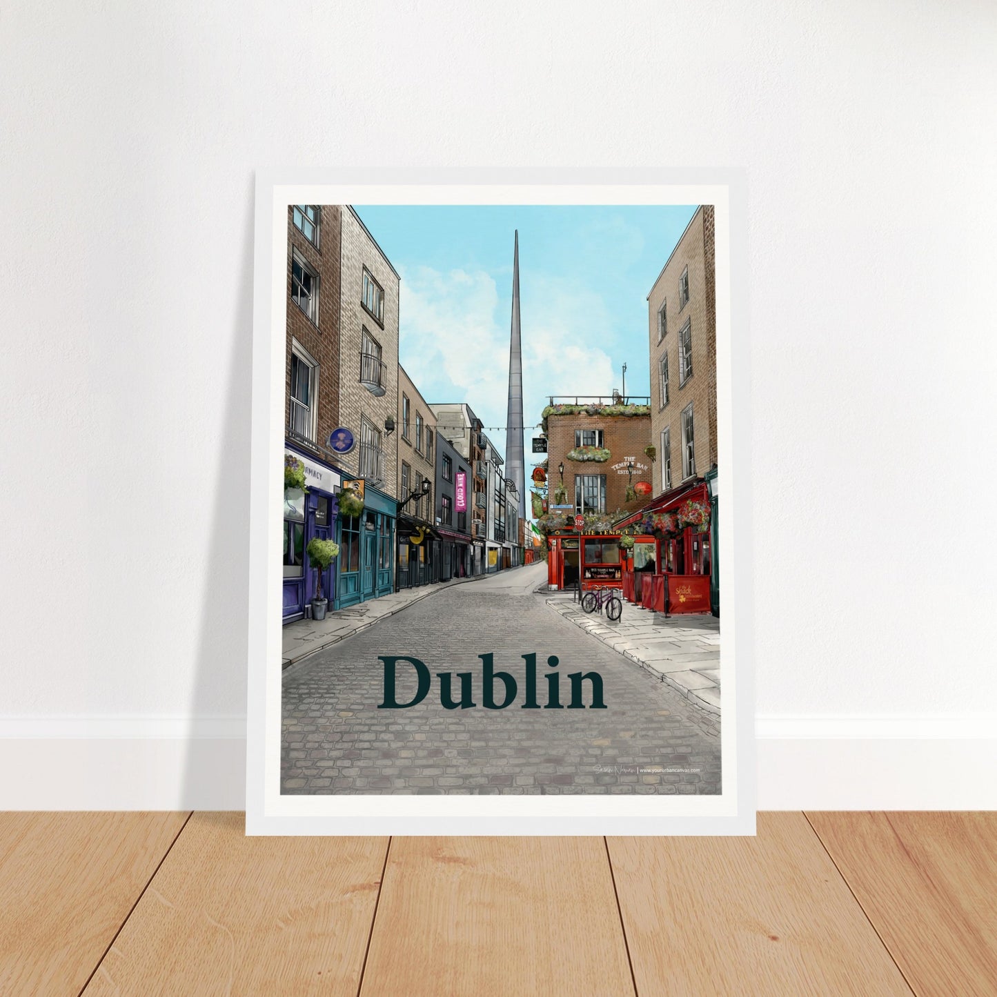 Dublin - Bold Typography print, size 30x40cm, framed in white wood, showcasing Temple Bar's cobbled streets, traditional shopfronts, and The Temple Bar Inn with The Spire in the distance