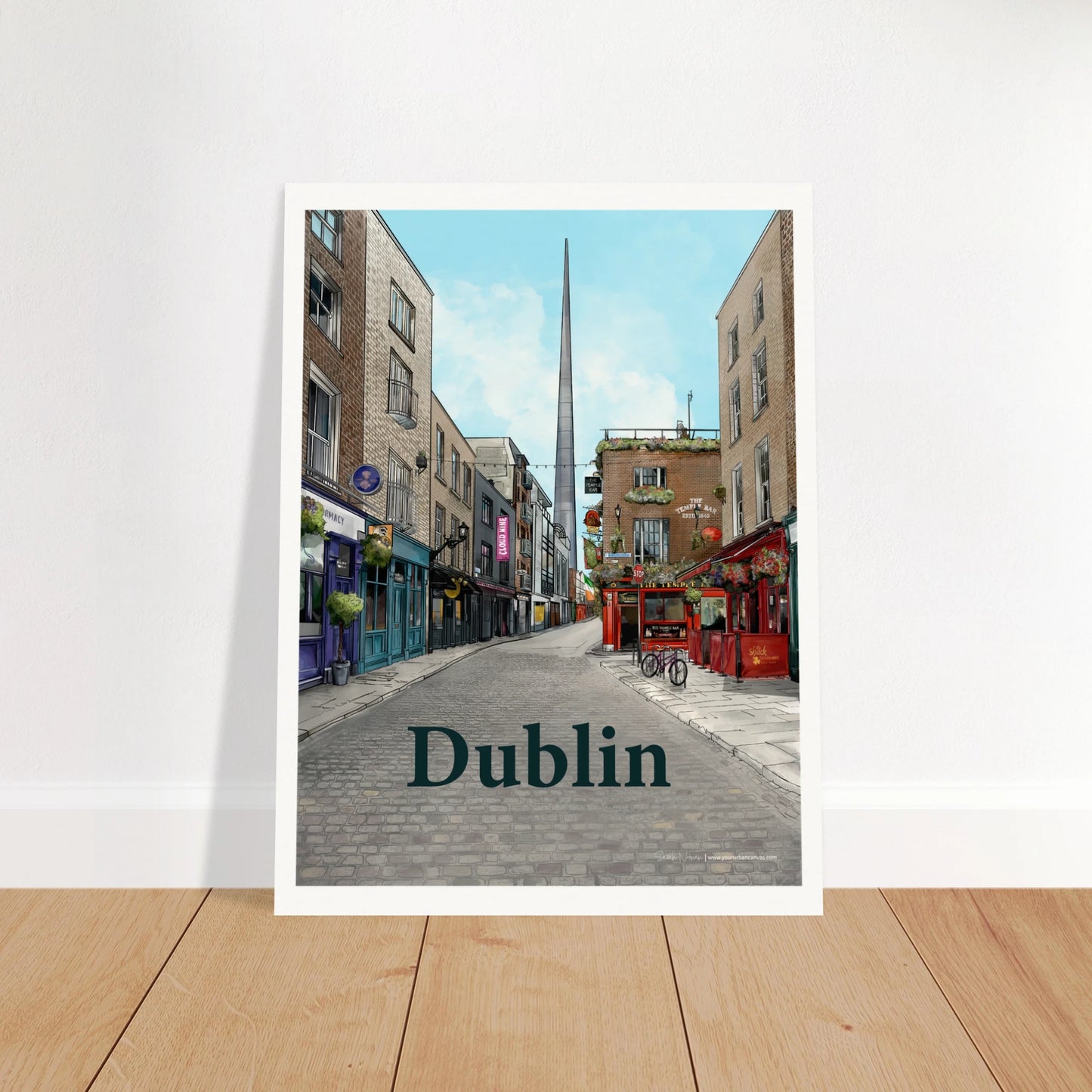 Dublin - Bold Typography print, size 30x40cm, featuring a cobbled street in Temple Bar, Dublin, with period buildings, shopfronts, and The Temple Bar Inn. The Spire stands in the distance, adding modern flair to this vibrant cityscape